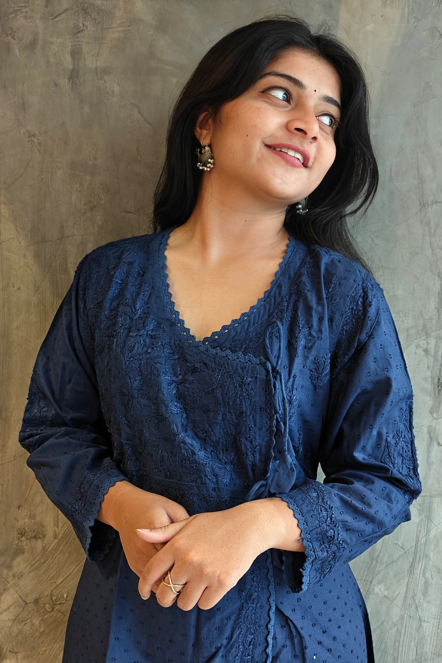 "Detail shot of Navy Blue A-Line Chikankari kurta hand-embroidered ethnic wear by Loomkar Raipur."