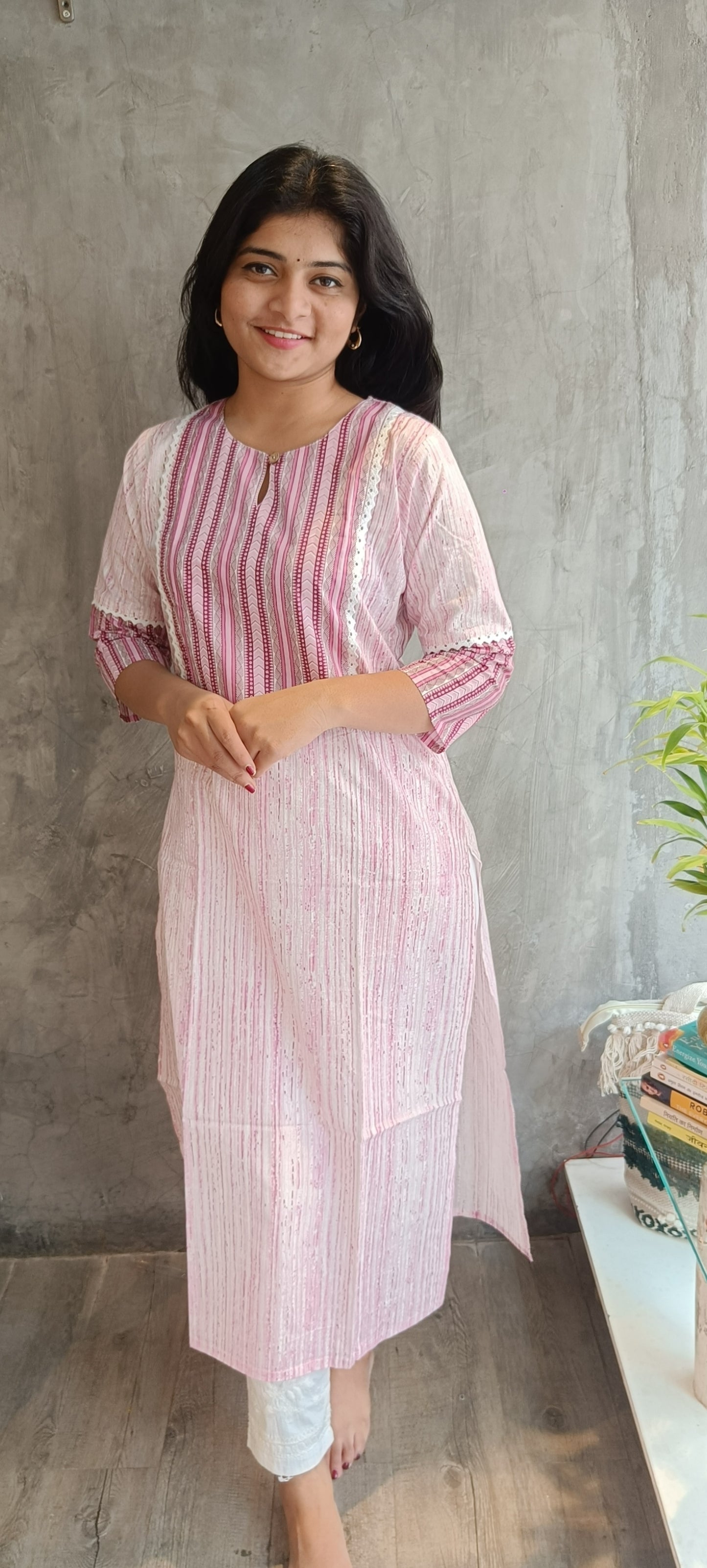 Model wearing a soft pink handloom cotton kurti by Loomkar, highlighting breathable premium fabric."