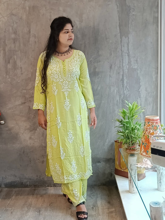 "Light green Chikankari outfit with floral motifs, heavy intricate embroidery, and matching printed pants - Loomkar handloom fashion."