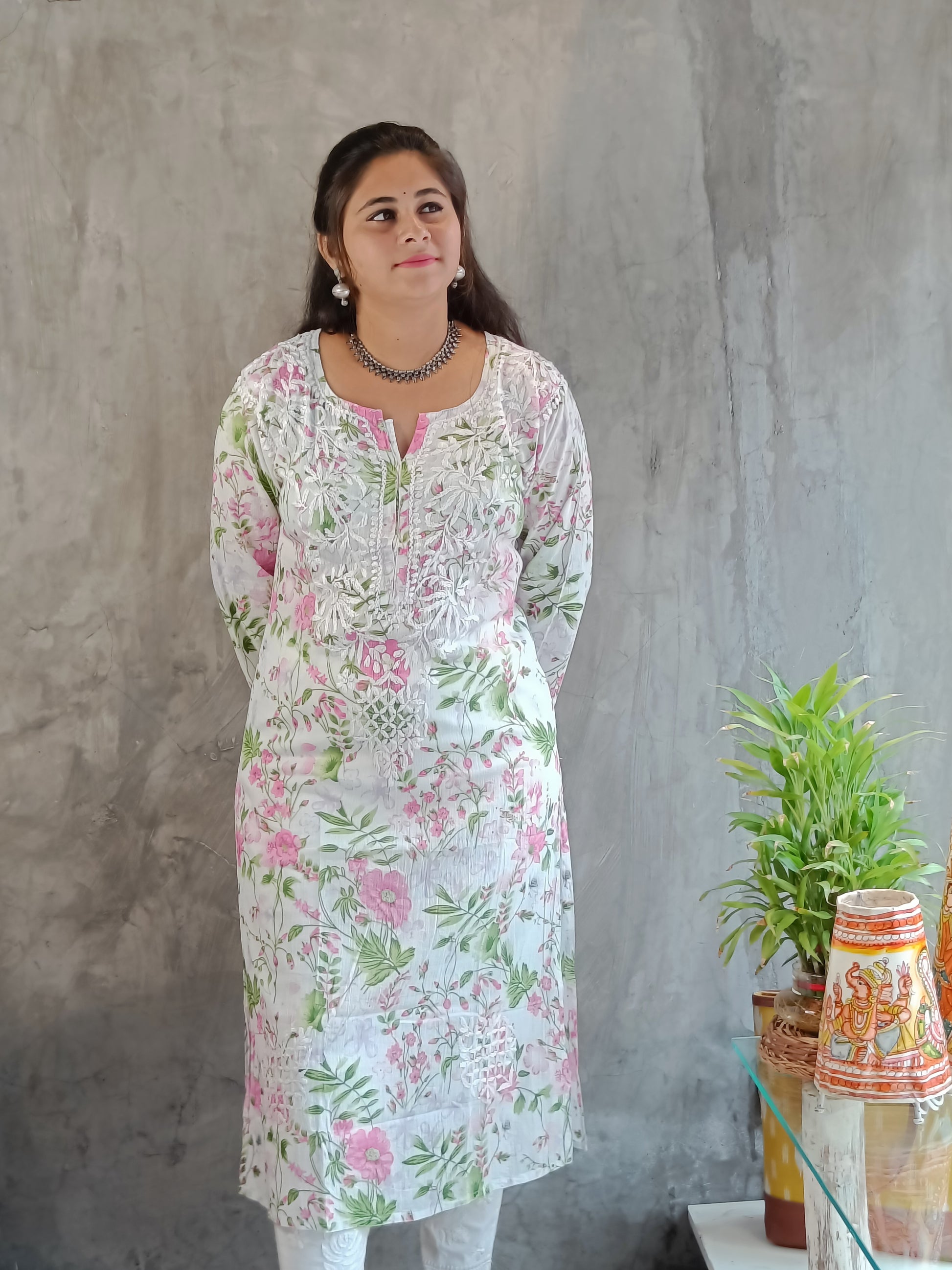 Close-up of handmade floral Chikankari  embroidered on white pink mal-mal kurti - Loomkar Raipur