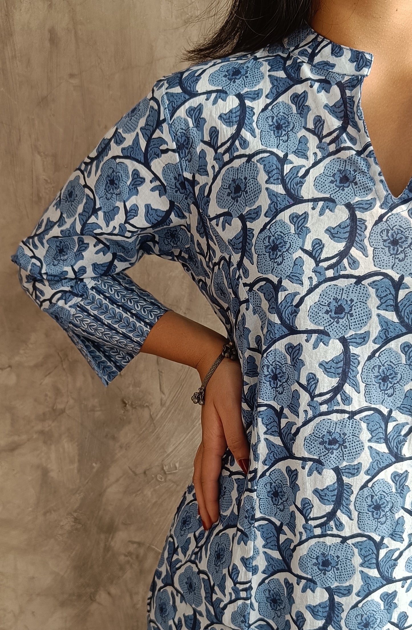 "Close-up of hand screen printed floral motifs on Indigo Cotton kurti and pant Set from Loomkar."