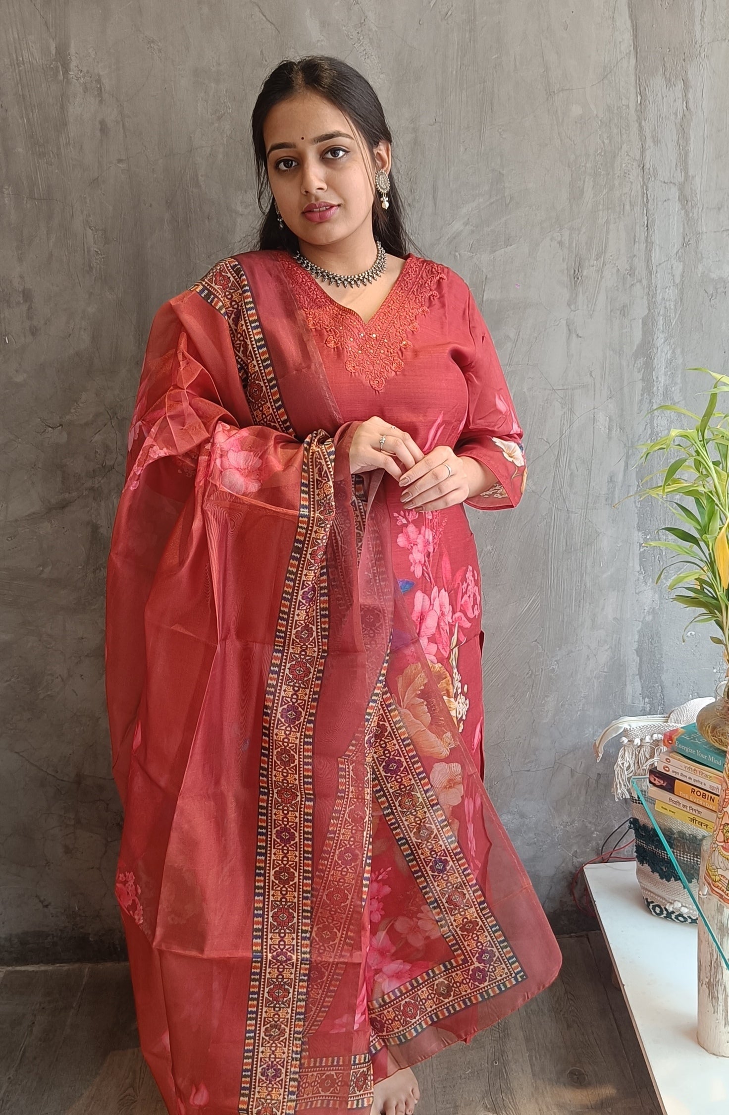 Close-up of rust cotton silk kurti showing straight fit and fabric texture
