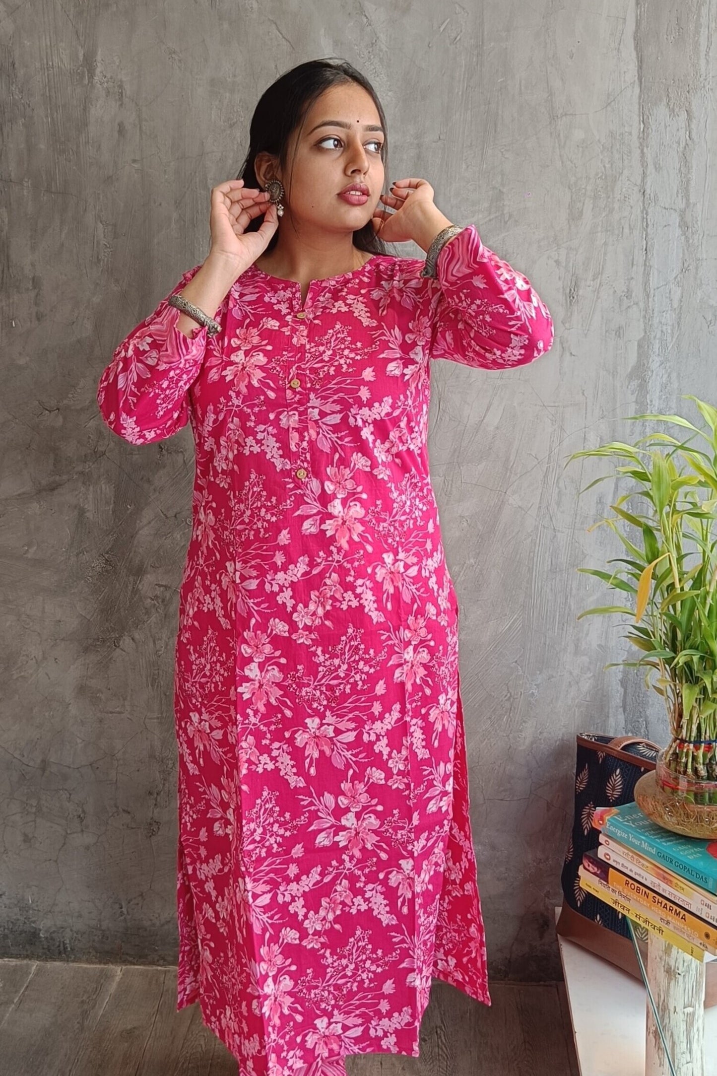 "Model wearing Loomkar's bright pink floral handloom cotton co-ord set ideal for office wear and casual meet ups"