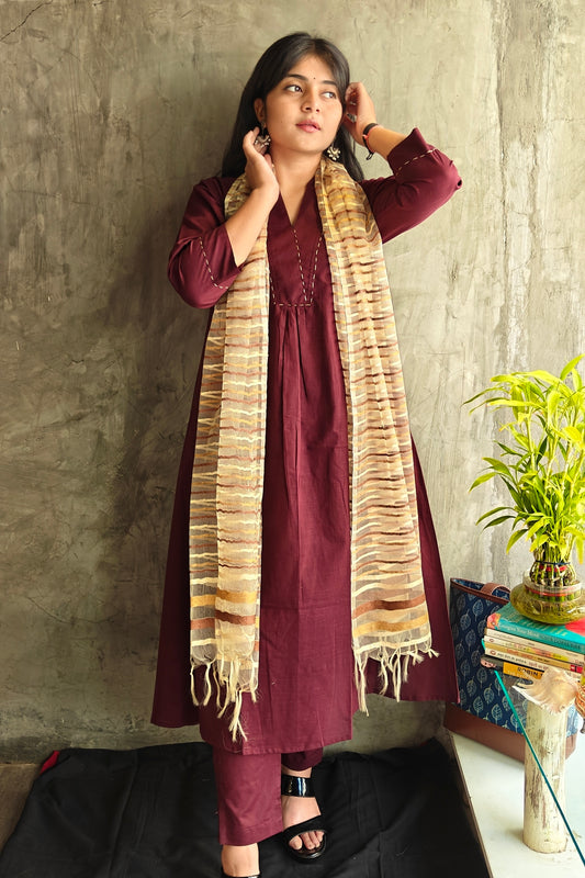 Model wearing Deep Wine Cotton Suit Set with matching pants and dupatta.