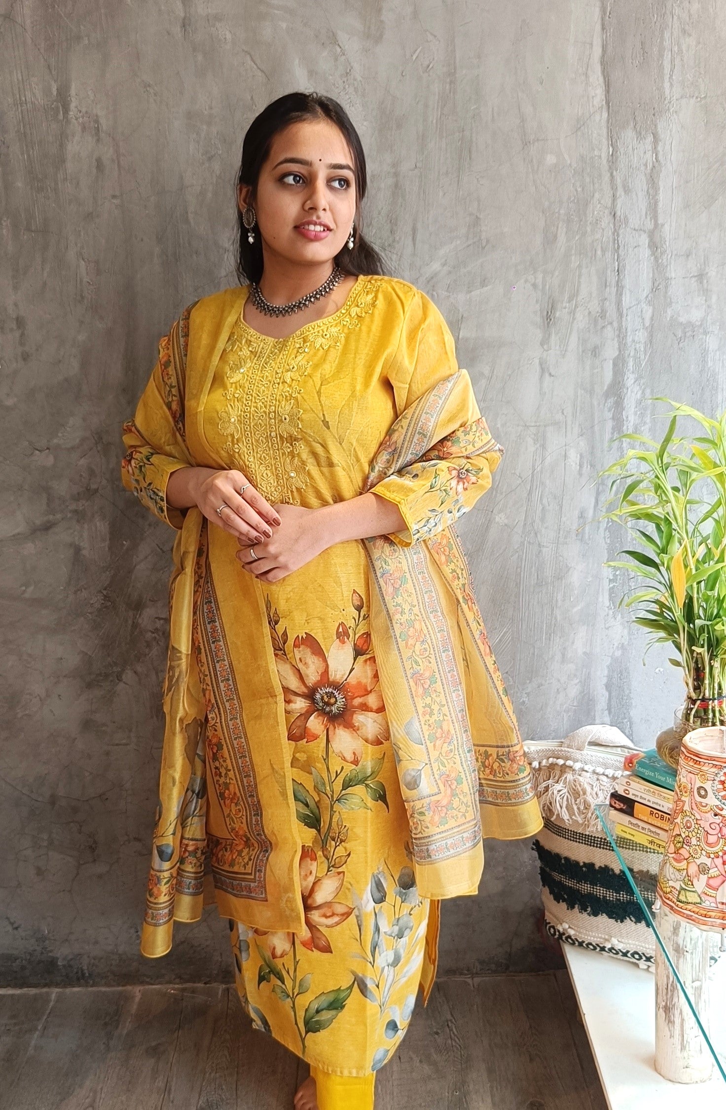Full view of yellow straight-fit kurti paired with pants and dupatta