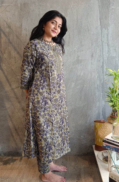 "Side profile of a woman wearing Loomkar's purple green Vanaspati handloom cotton co-ord set, ideal for office or casual wear."