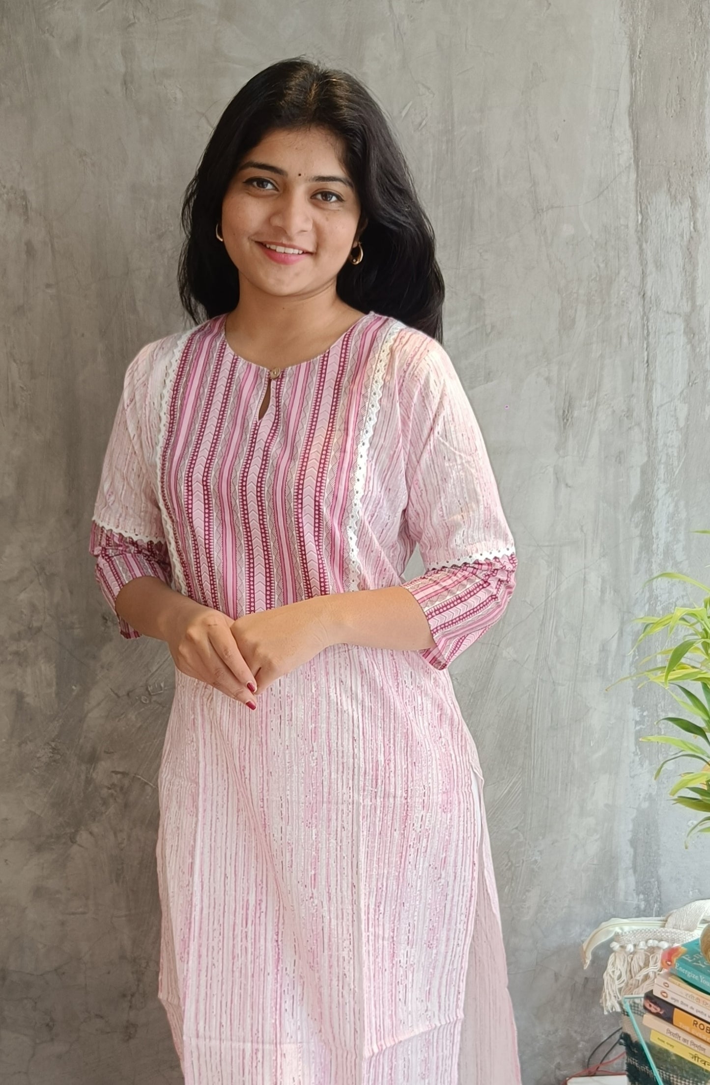 "Full-length view of Loomkar's soft pink floral handloom cotton kurti in Raipur, reflecting premium ethnic craftsmanship."