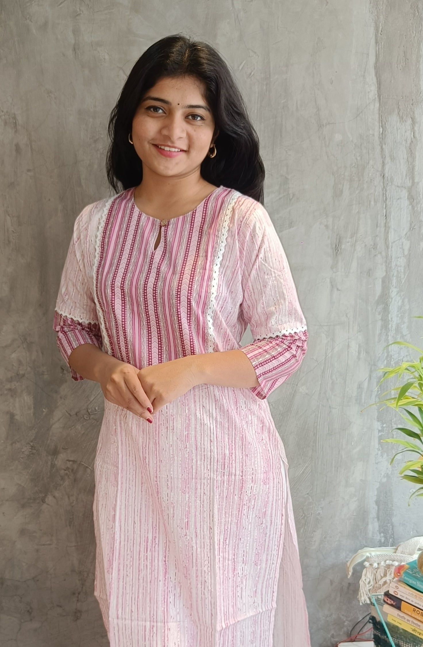 "Full-length view of Loomkar's soft pink floral handloom cotton kurti in Raipur, reflecting premium ethnic craftsmanship."