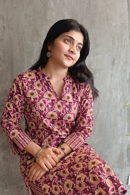 "Side view of woman wearing Loomkar Wine-Pink Floral Handloom Co-ord Set ideal for office or casual wear."